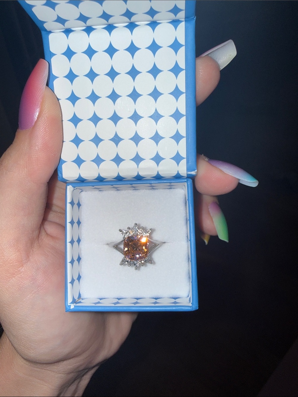Silver Ring with Peach Center Stone and Halo Accent